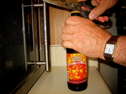 opening Strawberry Blonde
beer with a pair of scissors
DO NOT try this at home or
after consuming two or more
six-packs