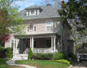 Picture of 70 Kenyon: bone clapboard Victorian with white trim