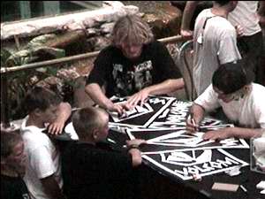 Mike and Ian Parnell signing the stone