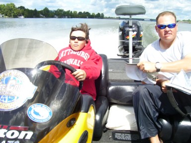 Marshall Maynard at the wheel of Kip Bodkin's boat