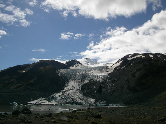 Thorsmork is a wide valley named after Thor, the Viking God of Thunder. The rugged nature of green valleys, steep mountains, clear creeks and wild rivers make Thorsmork one of the countrys most popular hiking grounds. Surrounded by 3 glaciers, Myrdalsjokull, Eyjafjallajokull and Tindfjallajokull in the southern part of Iceland, it offers a  great picturesque panorama and landscape. Its only about 160 km east of Reykjavik but the last 30 km is one of greatest strips of mountain track you encounter Ewith unbrigded rivers and streams to cross. We visited here after stopping off at the Seljalandsfoss Waterfall, and it was a nice sunny summers day, perfect for travelling in Iceland