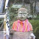 Ojizo in his distinctive bib at Yakuoji Temple in Shikoku