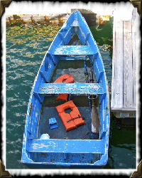 rowboat beside dock