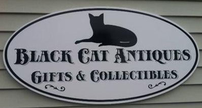 sign for Black Cat Antiques
