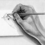 hand drawing a picture