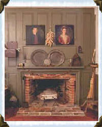 pewter dishes above fireplace