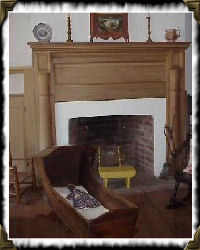 cradle by fireplace