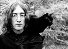 John Lennon with black cat