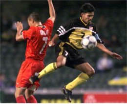 Malaysia Ahmad Shahrul Sofian controls the ball against Hong Kong's Kwok Man Tik.