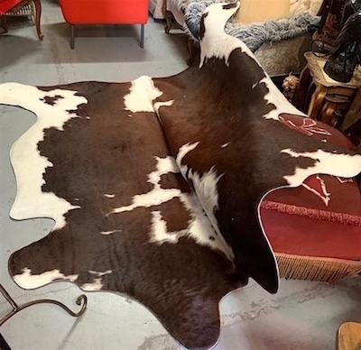 Brown and White Cowhide Synthetic Rug